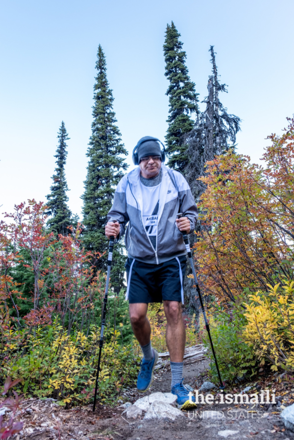 Perseverance shows on Akbar’s brow as he climbs Mount Whistler.