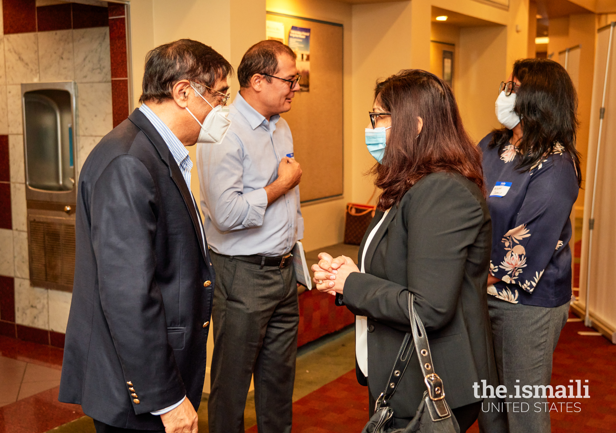 Dr. Asani speaks with participants before his lecture at the Ismaili Jamatkhana in Decatur, GA.