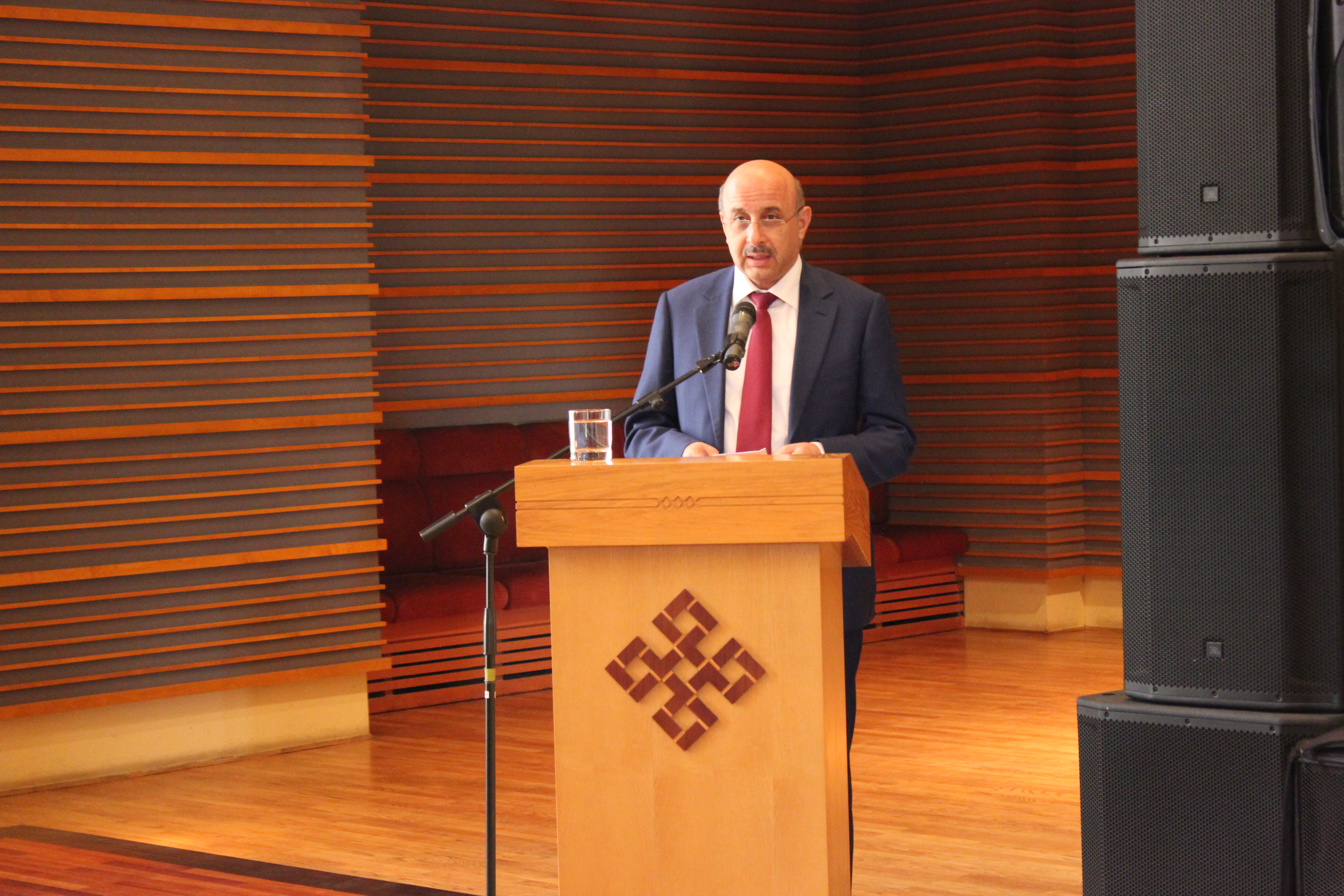 National Council’s President Muzaffar Jorubov delivers closing remarks at the event