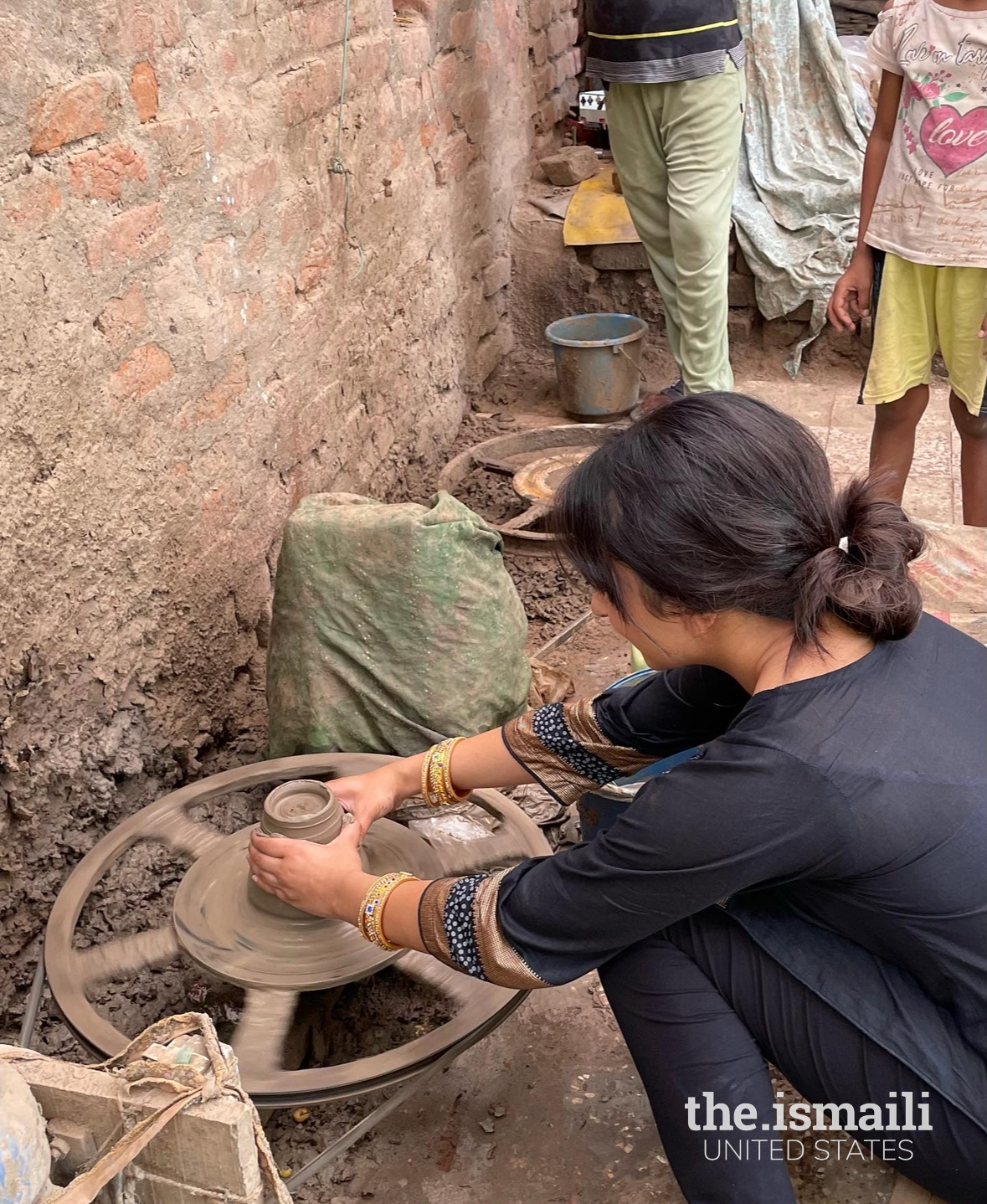 After my last class, the villagers of Chaya Baug taught me how to make pottery on their machine, so I can take the pot I make home as a souvenir.