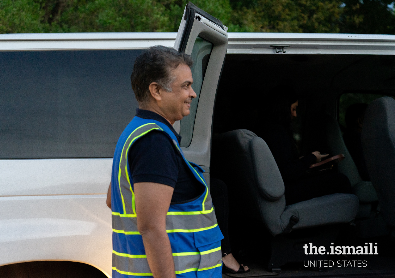 Vasu Vanapalli serves with a smile at the Houston Ismaili Jamatkhana and Center.