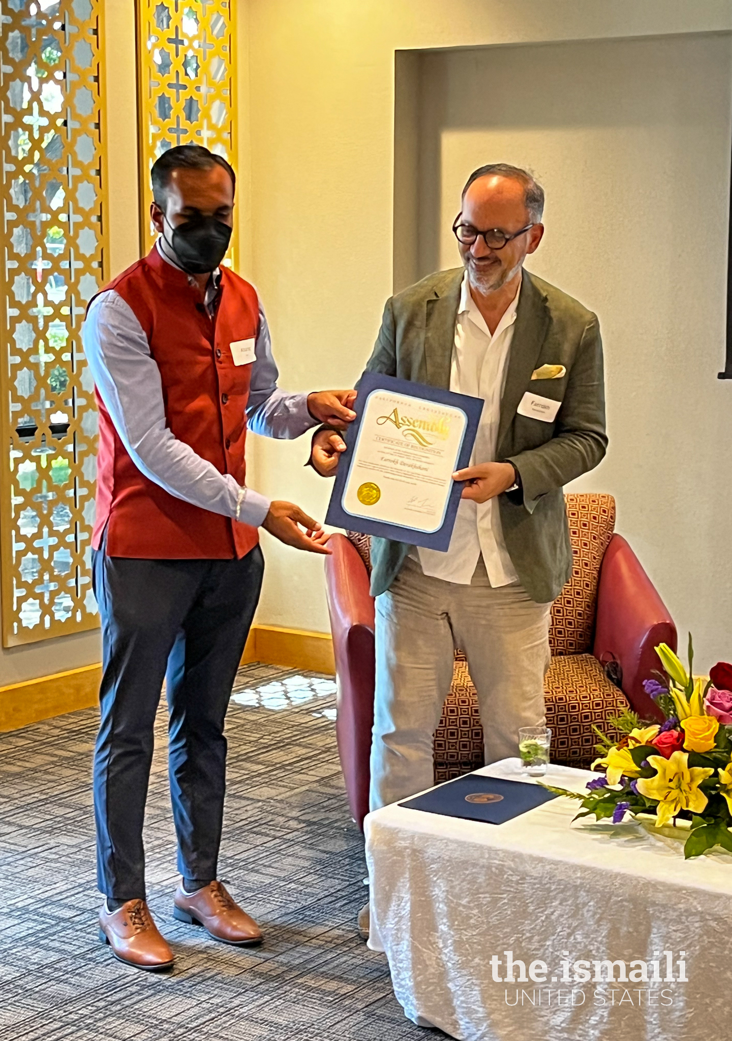 Dr. Derakshani receiving a Letter of Commendation from California State Assembly Member Alex Lee