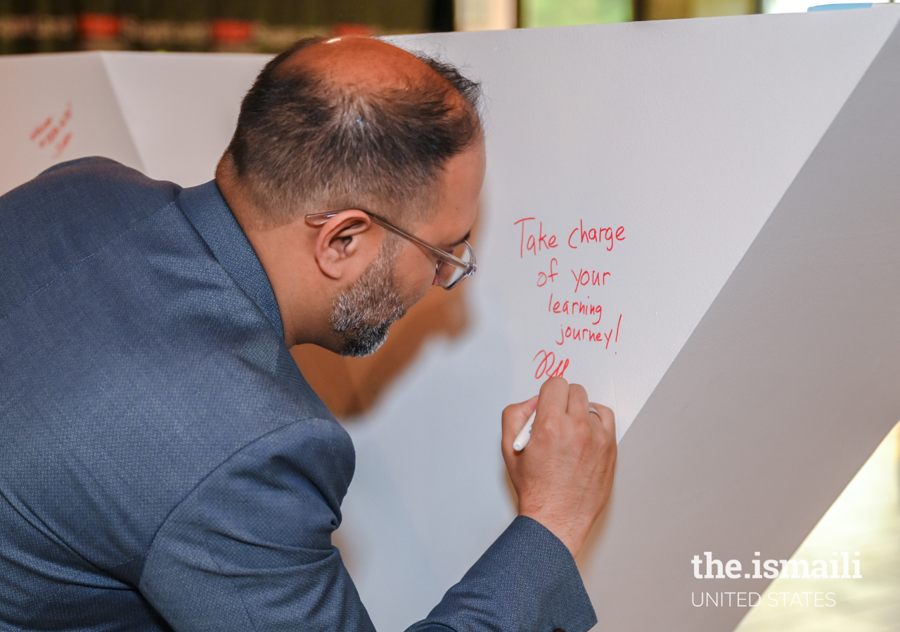  Speaker Ryan Makhani captures his contribution to the TEDx sculpture, “Take charge of your learning journey!”