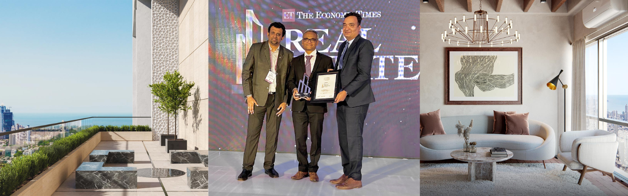 Mr Vipin Mittal (centre), CEO of the Aga Hall Estate project accepts the Iconic Residential Project of the Year award.