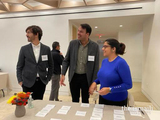 Attendees Malik Dhanani and Sebastian Waltzing arrive and check in for the Speaker Series event at Manhattan Jamatkhana