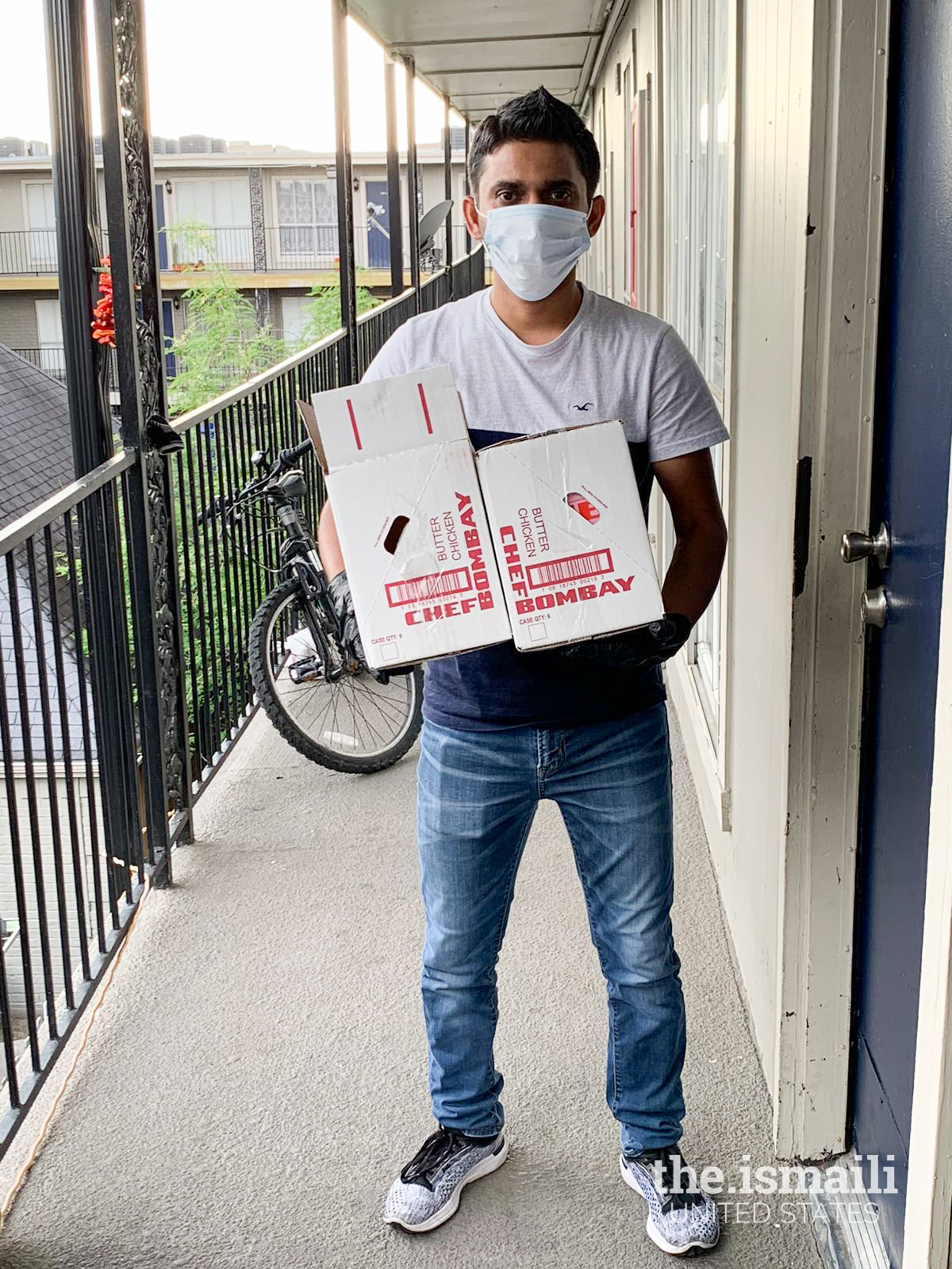 Volunteer delivering food to a family in Houston 