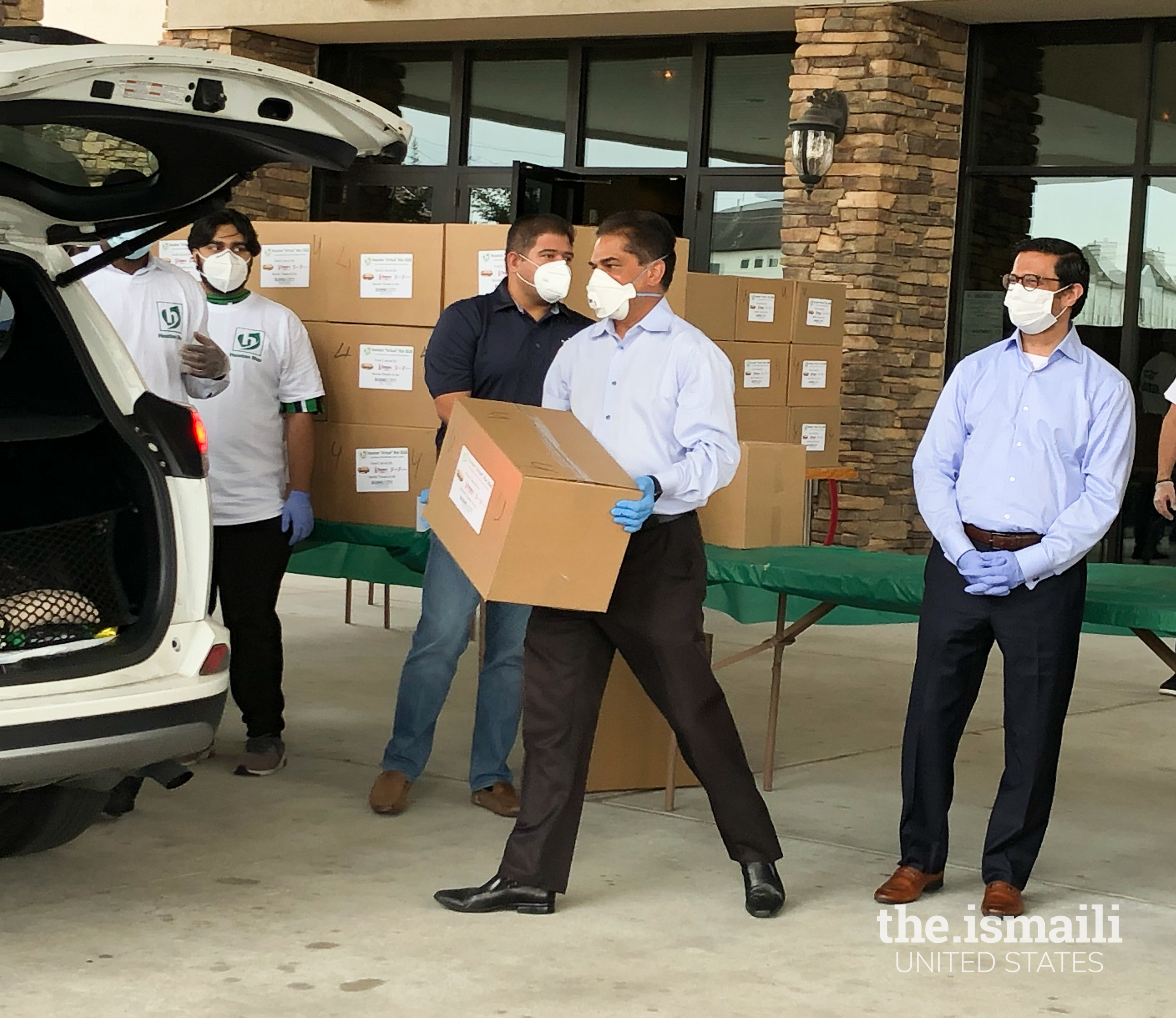 Safety volunteers during Iftar food donations, Houston.