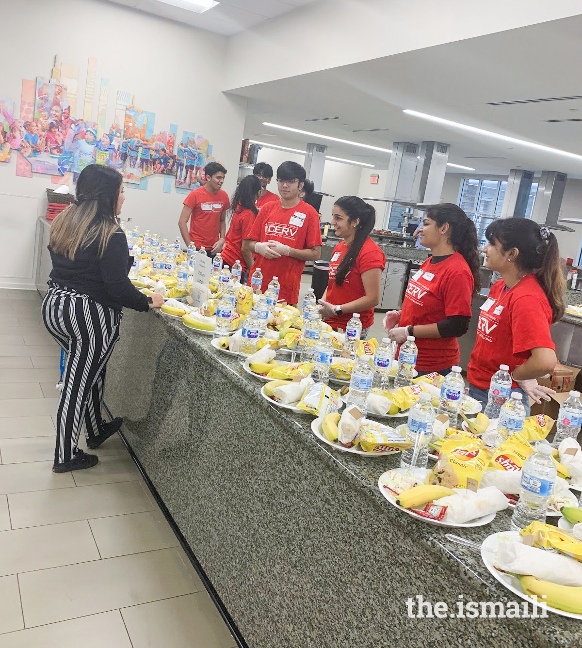 Sugar Land and Katy I-CERV getting ready to serve lunch to the Ronald McDonald Holcombe families.