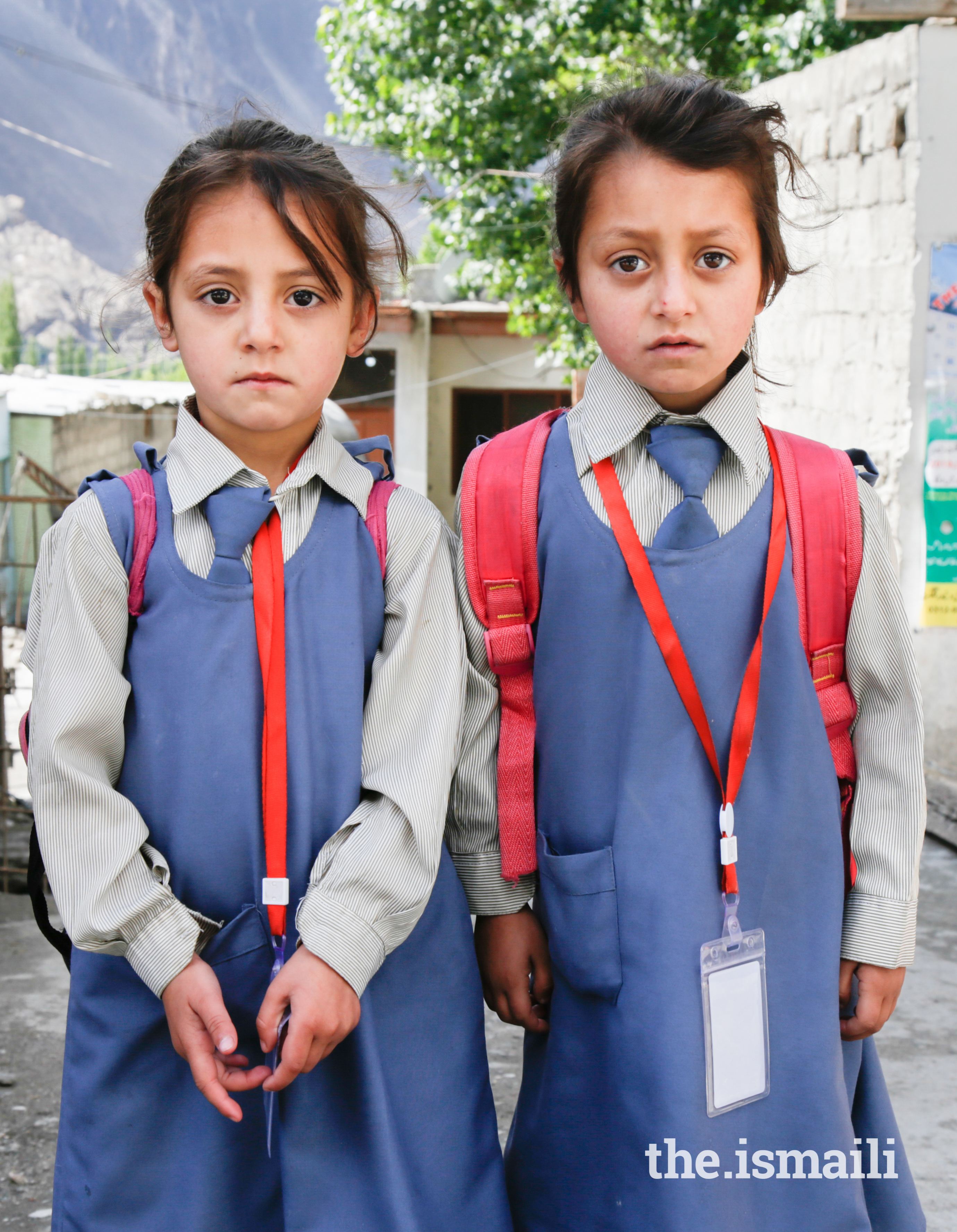 Young Ismaili sisters, Sohana (grade 1) and Fiza (ECD-2), on their way to a school in Aliabad, Hunza.