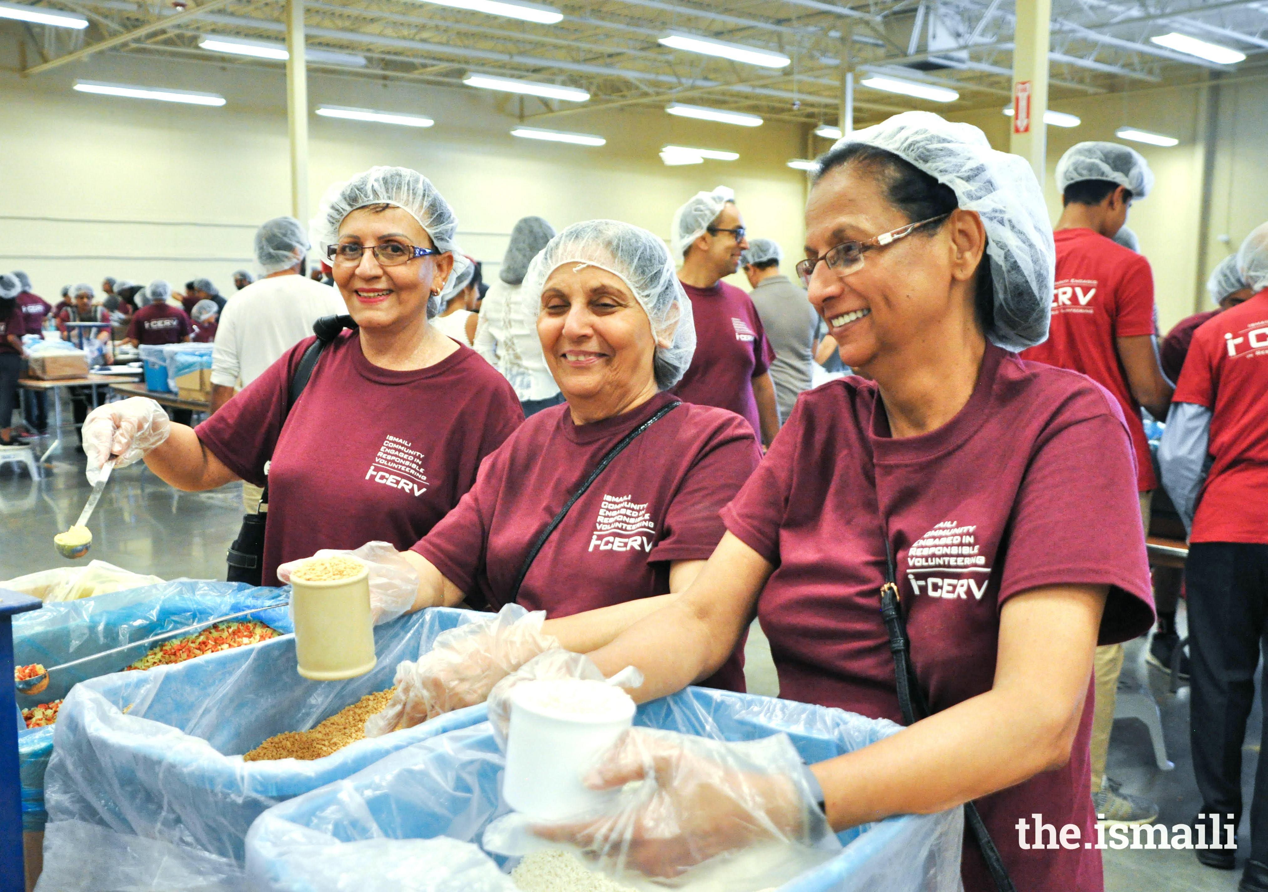 I-CERV volunteers and others packing nutritional packs in partnership with Feed My Starving Children, Chicago.