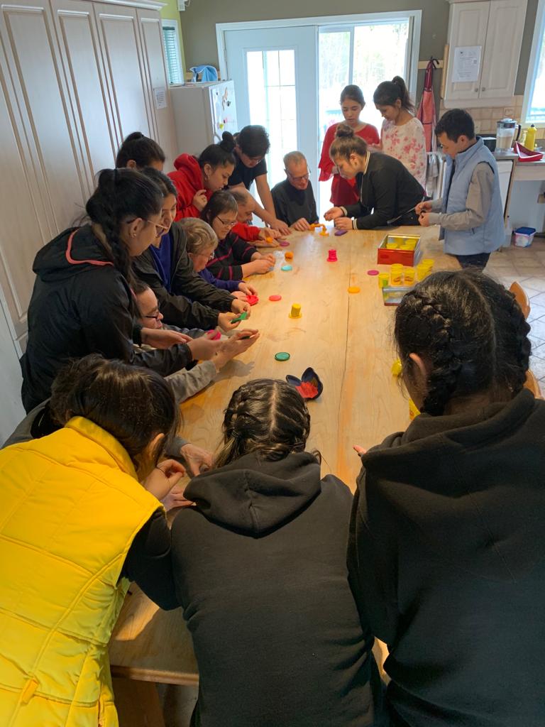 Young members of the Jamat in Sherbrooke gathered to serve the natural environment and contribute to the local community.