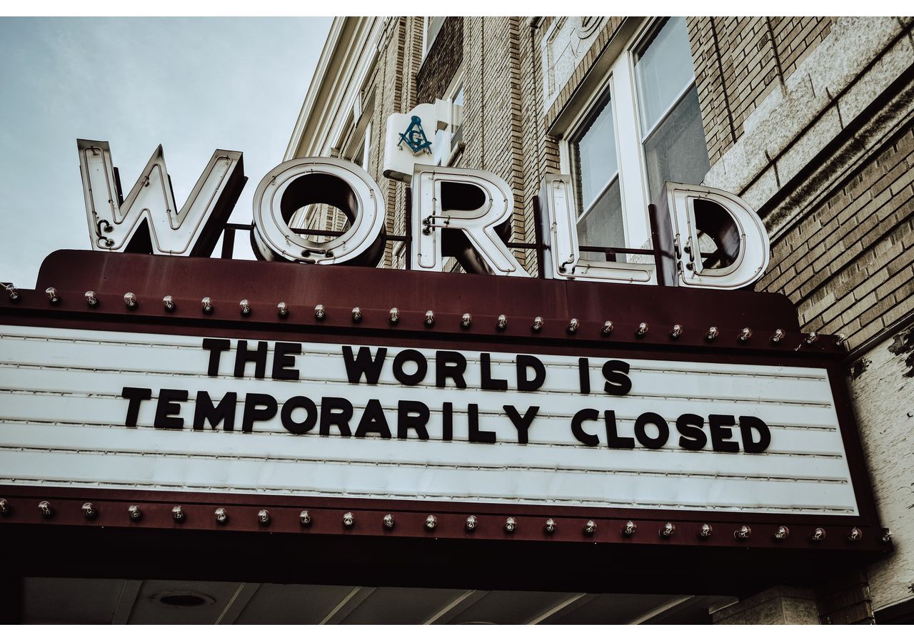 A marquee sign that depicts much of the world.