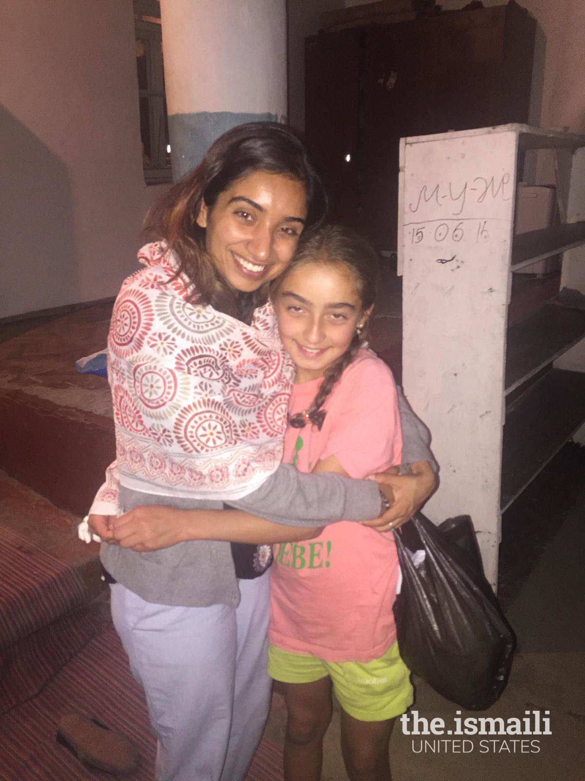 Alisha Bhimani with one of her students from the nearby Dua Khana, for whom she left all her English books.