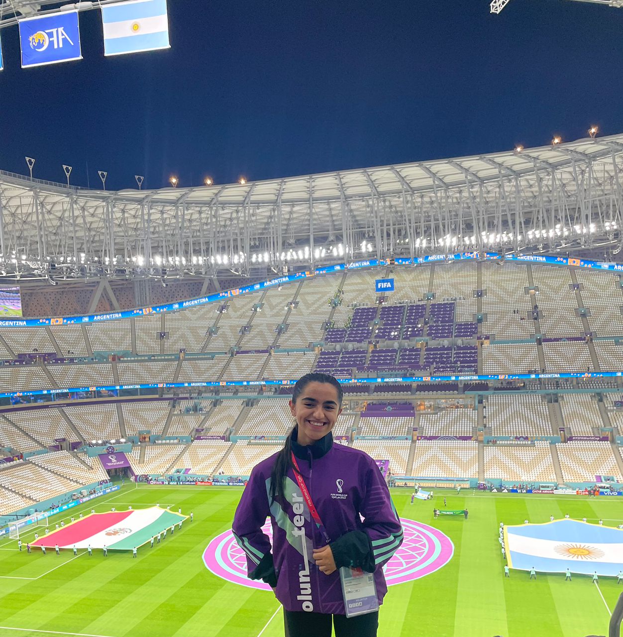 Jamolbi in FIFA volunteer uniform