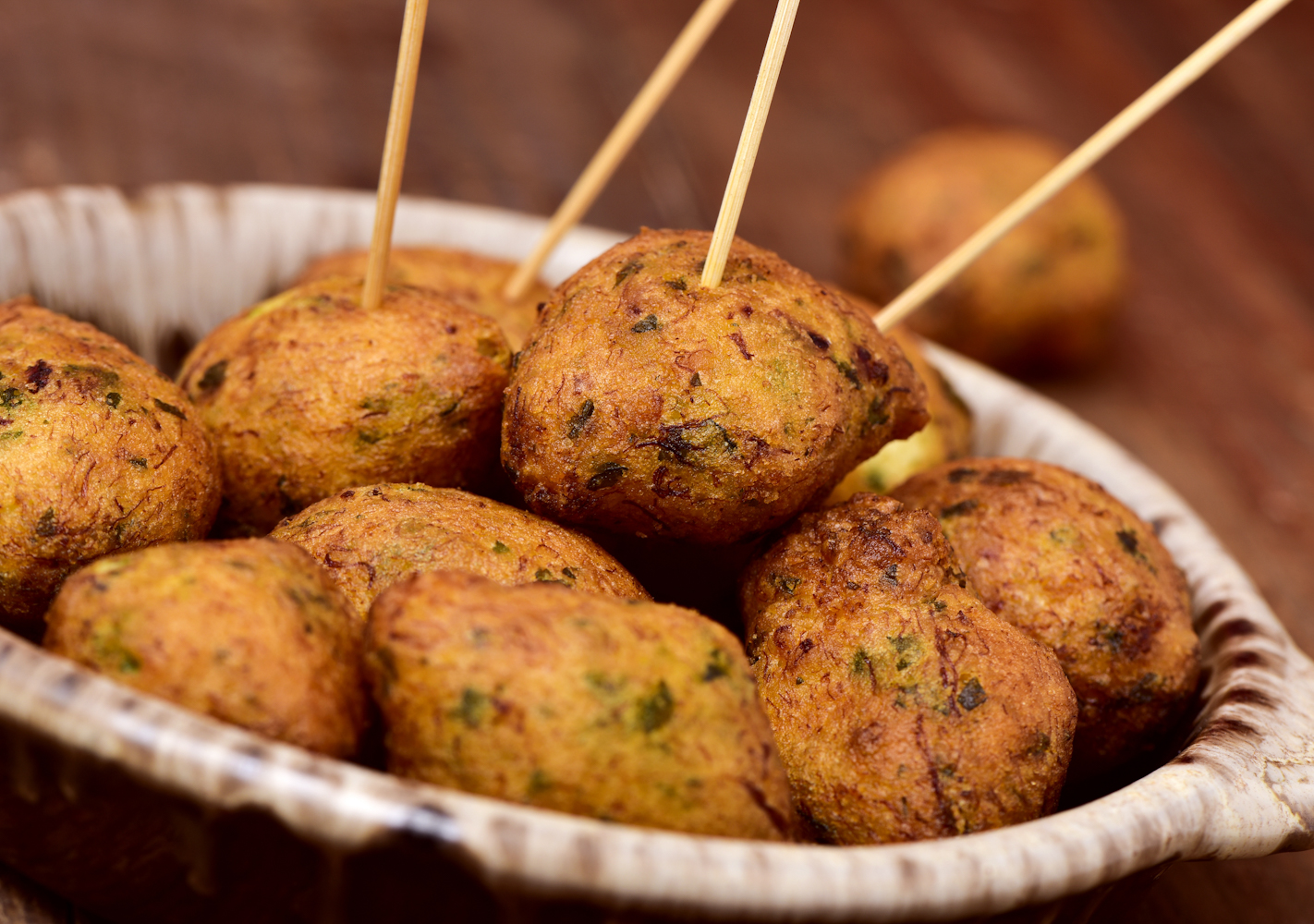 Fulfill your craving for fried food with these delicious Portuguese-style cod fritters.