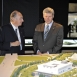 Mawlana Hazar Imam and Prime Minister Stephen Harper in the Exhibition Tent, examining the architectural model.