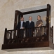 Mawlana Hazar Imam together with Prince Rahim and Princess Zahra overlooking the entrance hall of the Ismaili Centre Dubai from the balcony above. 