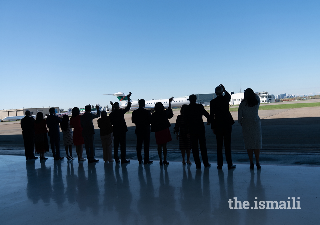 Leaders of the Jamat wave goodbye as Mawlana Hazar Imam departs after a 12-day visit to Canada.