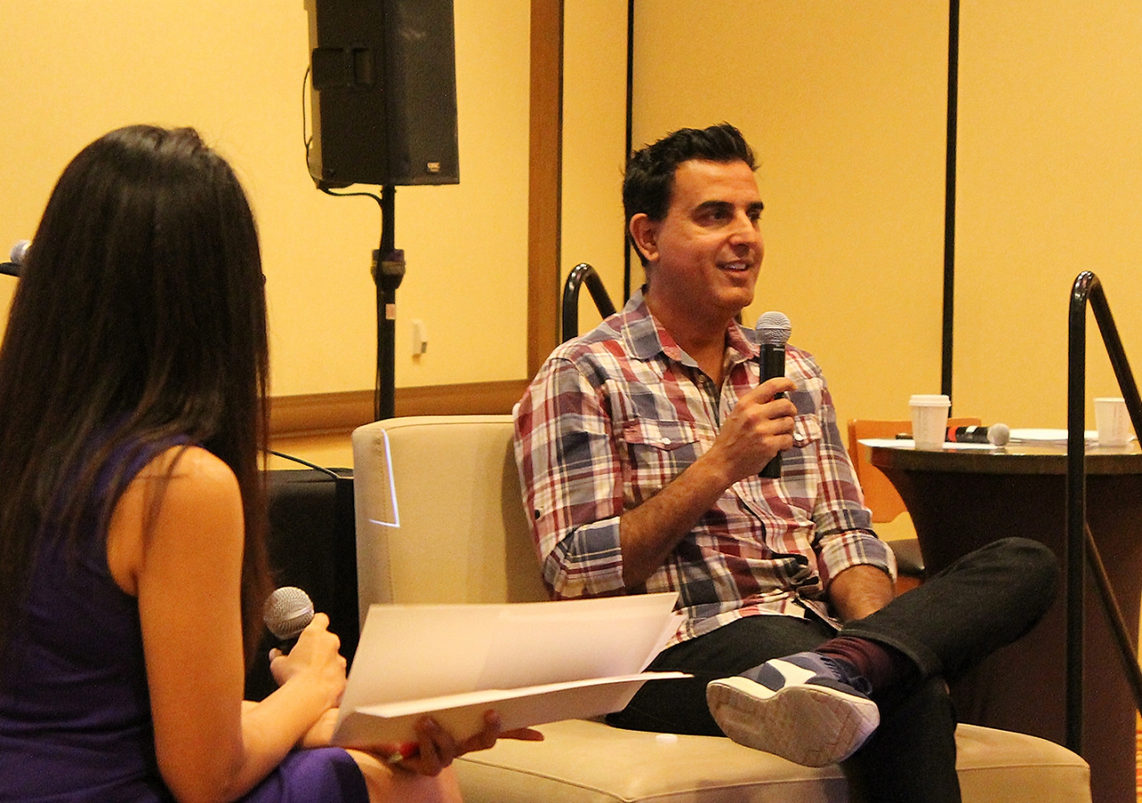 Keynote speaker Razor Suleman shares his startup lessons with the audience during a Fireside Chat with Sehr Charania.