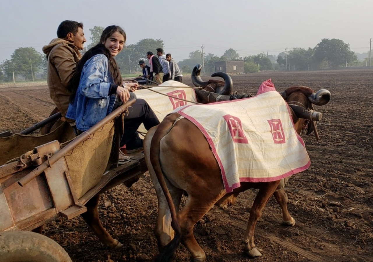 A day in the life of a farmer: GE Expedition participants join in an early morning excursion with Ismaili farmers.