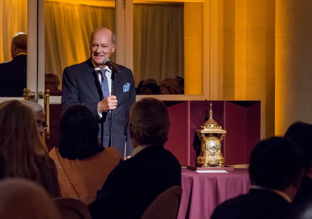 Prince Amyn addresses the gathered audience on the occasion of his birthday, after being presented with a 19th century gilt bronze and champlevé enamel clock.