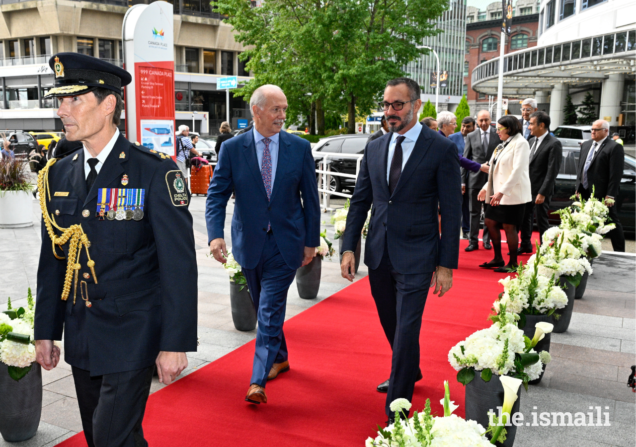  Premier of British Columbia John Horgan welcomes Prince Rahim to Canada Place, along Vancouver's waterfront, on 29 September 2022.