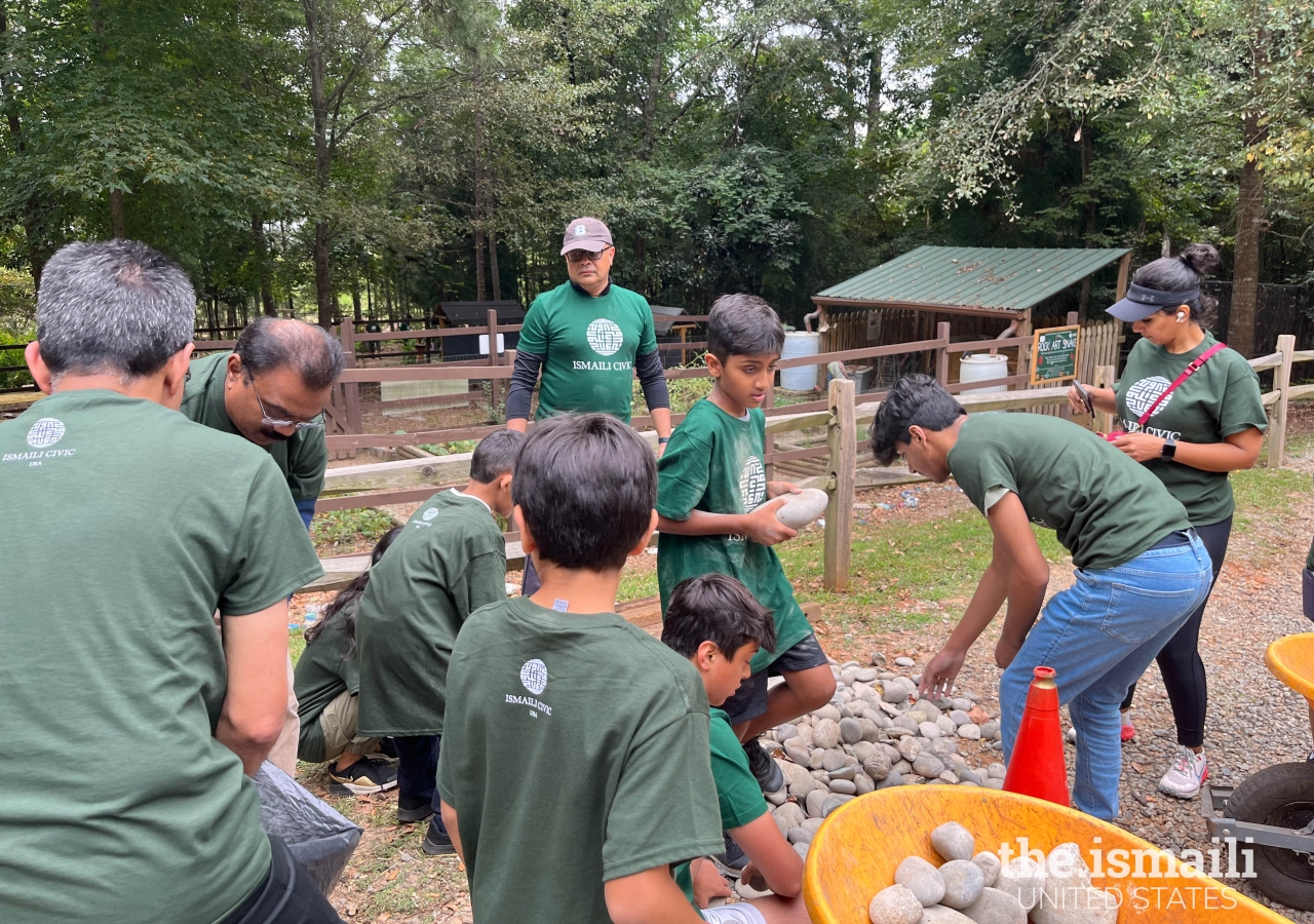 Ismaili CIVIC volunteers supported in beautifying Autrey Mill Nature Preserve on Global Ismaili CIVIC Day by cleaning up trails and laying rocks to help control water flow.