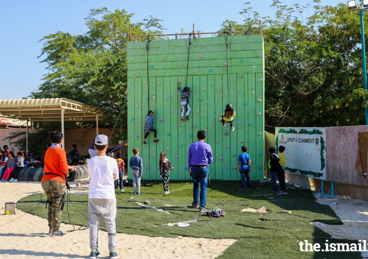 Wall climbing under supervision of trained professionals