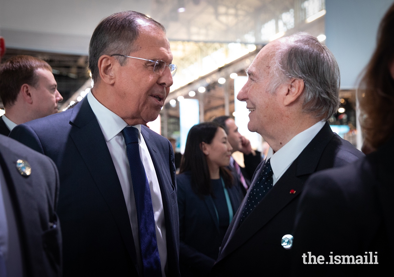 Mawlana Hazar Imam greets Russian Foreign Minister Sergey Lavrov during the opening session of the inaugural Paris Peace Forum.