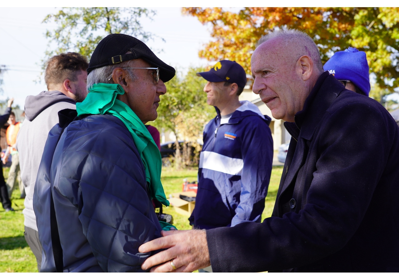 Sacramento Mayor Darrell Steinberg greets Dr. Rafiq Dossani from the Steering Committee for the Agreement of Cooperation with the State of California, at the start of the Climate Action Day