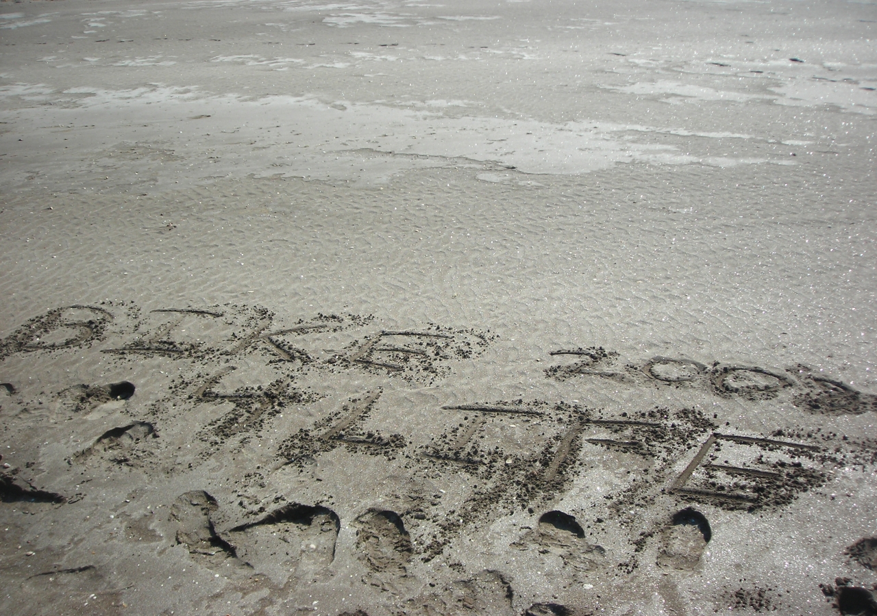 The Bike4Life 2008 participants leave their mark on a sandy beach along the Konkan Coast.  