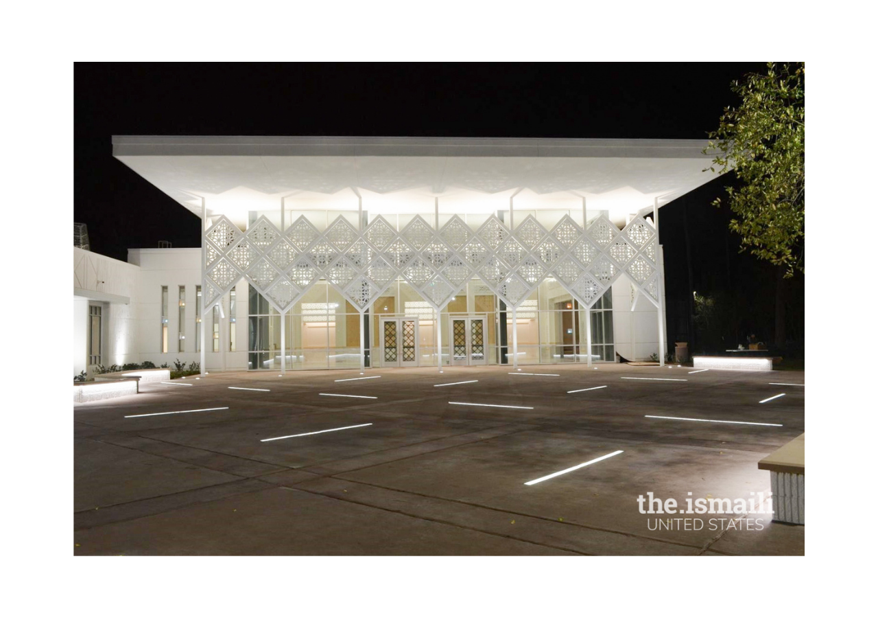 A view of the main courtyard and entrance in the evening.