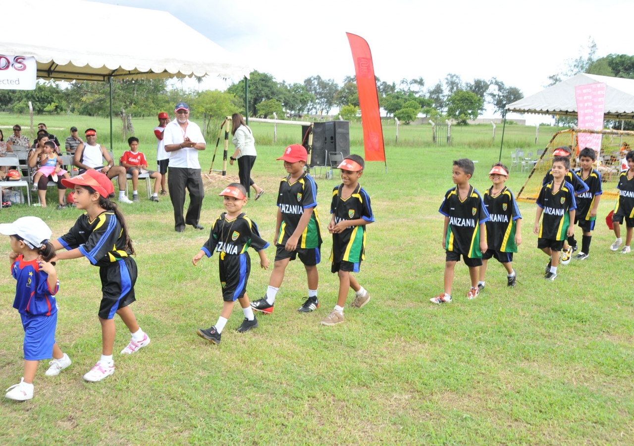 Children line up for the opening soccer match.