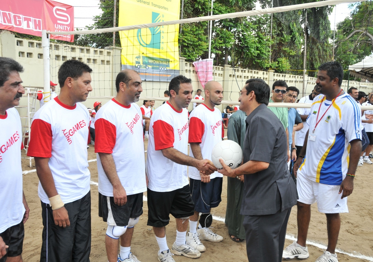 President Zahir Jivani of the Ismaili Council for Tanzania is introduced to members of the Canadian volleyball team.