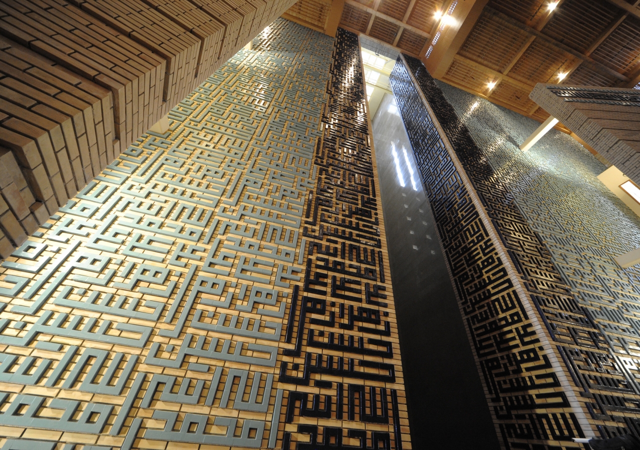 Light, cast across a wall of calligraphic repetition of the names “Allah”, “Muhammad”, “Ali”, “Hasan”, “Hussain” and “Zahra”, is the dominant feature of the Prayer Hall at the Ismaili Centre, Dushanbe. 