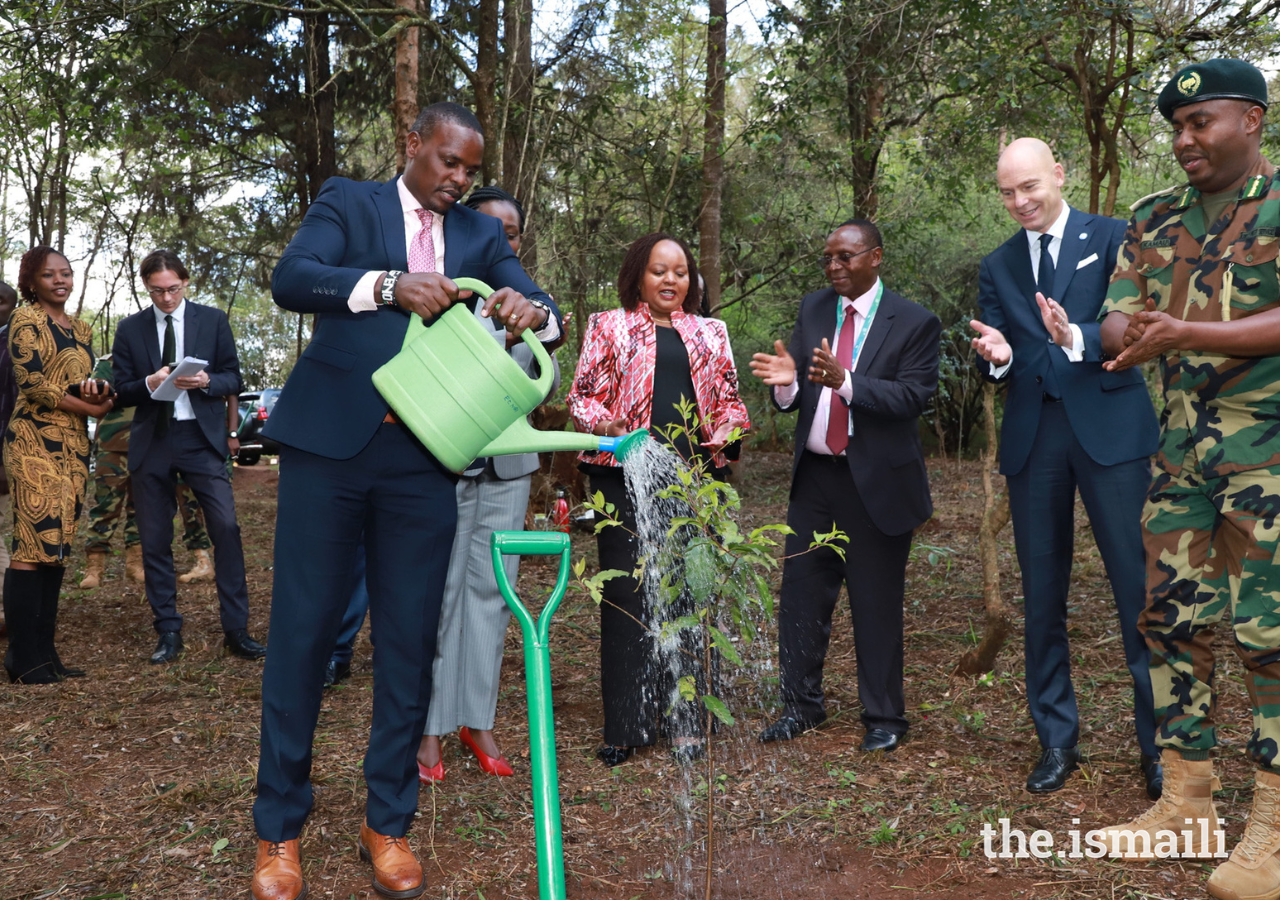 Delegates plant a tree to commemorate the fourth Kusi Ideas Festival held at Karura Forest in Nairobi.