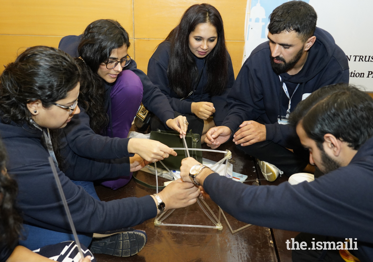 Participants at the Rang Arts and Culture Expedition take part in a team-building exercise.