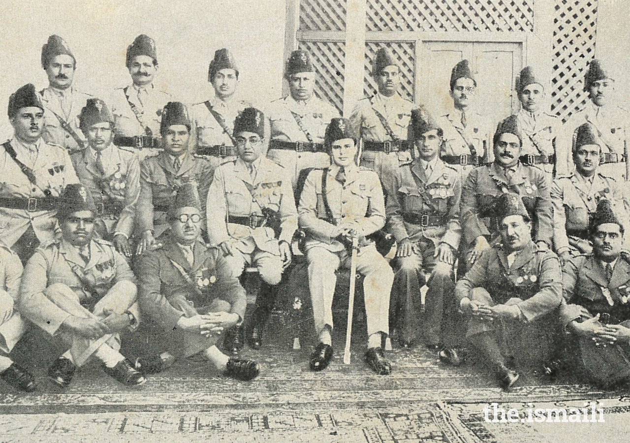 Prince Aly Khan in IVC uniform with IVC officers.