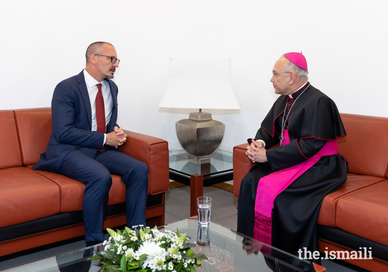 Prince Rahim in conversation with Monsignor Edgar Peña Parra, the Substitute for the Secretariat of State at the Vatican.