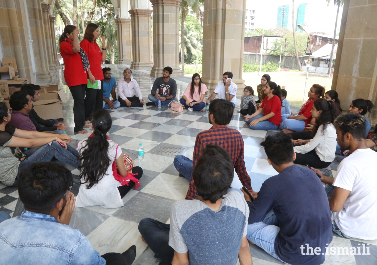 Heritage walk participants being explained the history and architecture of Hasanabad- Mausoleum of Imam Hasanali Shah in Mumbai.