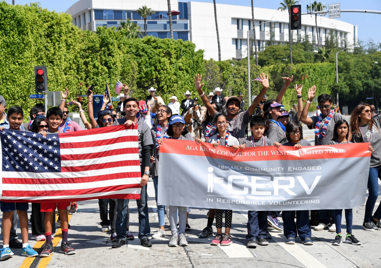 Ismaili Community Engaged in Responsible Volunteering (I-CERV) participates in the July 4th parade in Santa Monica, California.