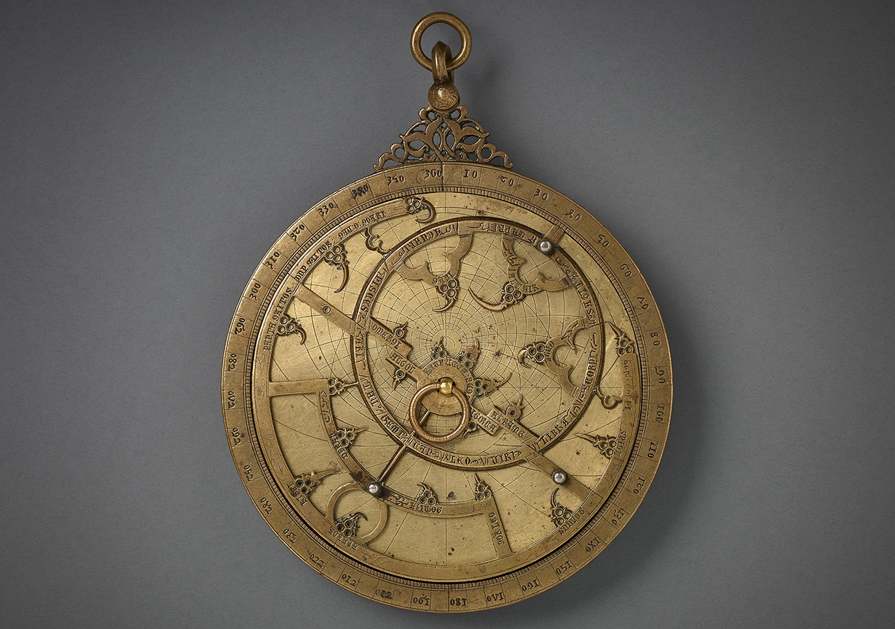 An astrolabe, likely made in Muslim Spain and dating back to the 14th century. Made of bronze and inlaid with silver, the instrument bears the names of constellations in Arabic and Latin, with additional inscriptions in Hebrew.