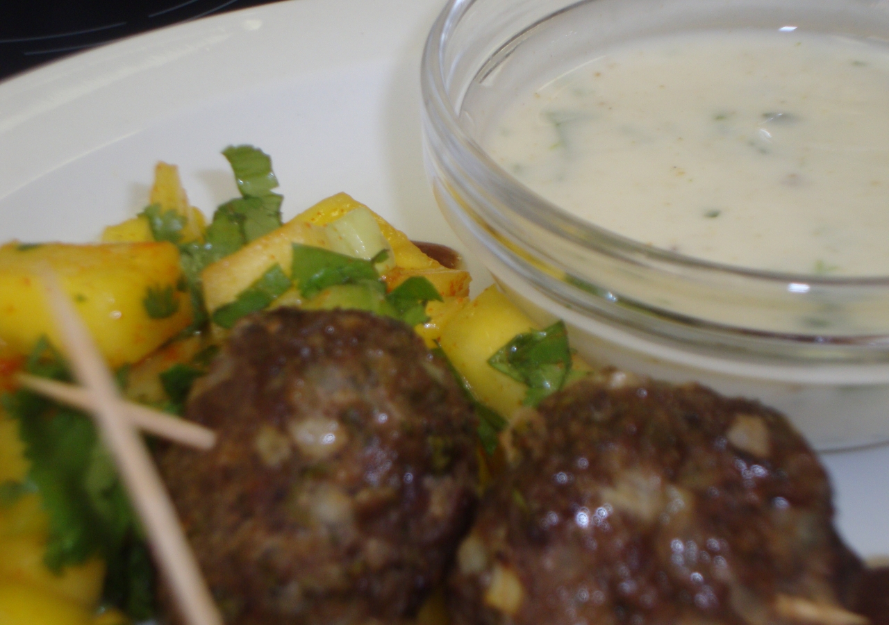 Tasty kebabs that are ready to eat, together with a yoghurt dip.