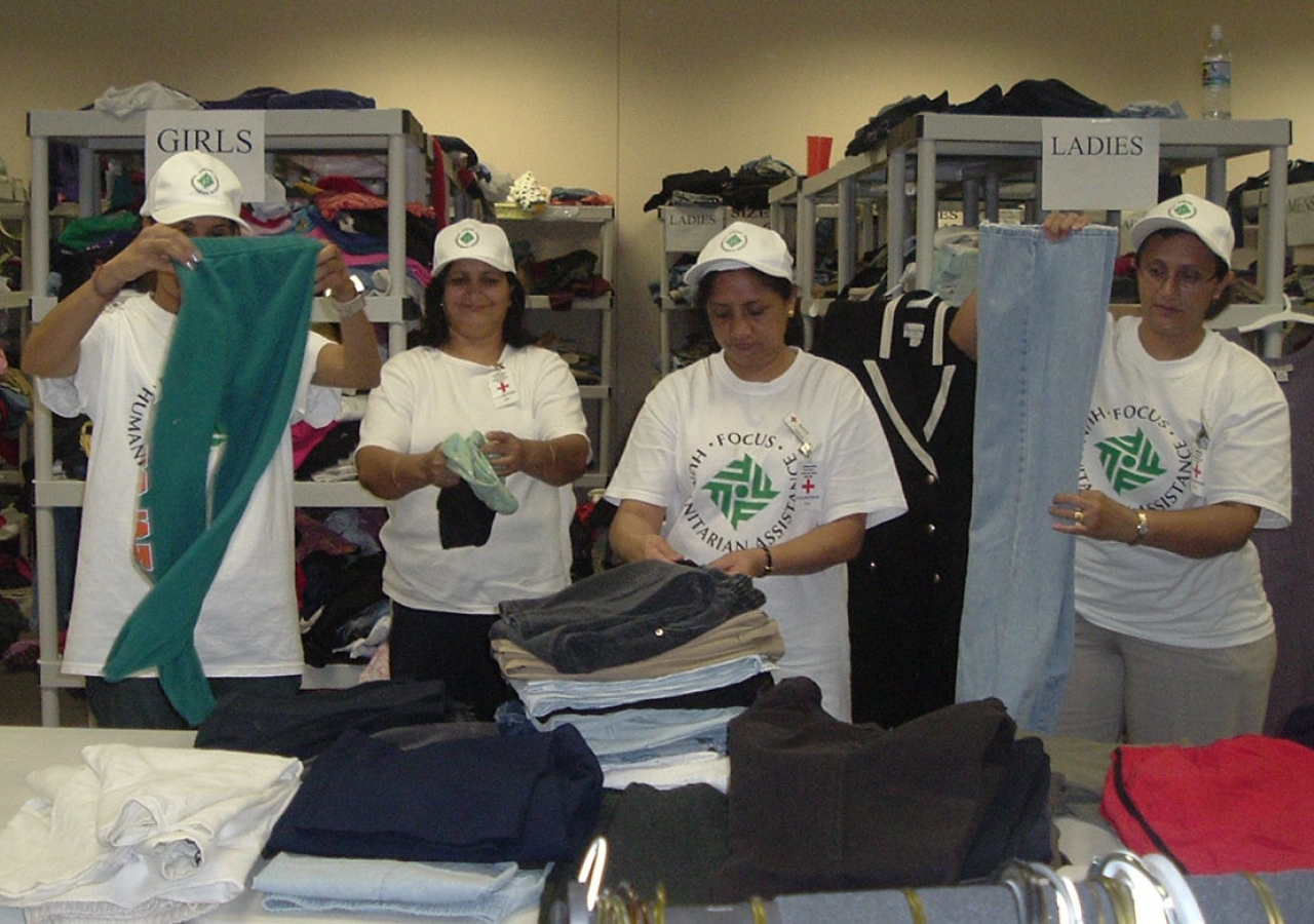 FOCUS volunteers and staff in San Antonio work to sort and distribute clothes to help those affected rebuild their lives.