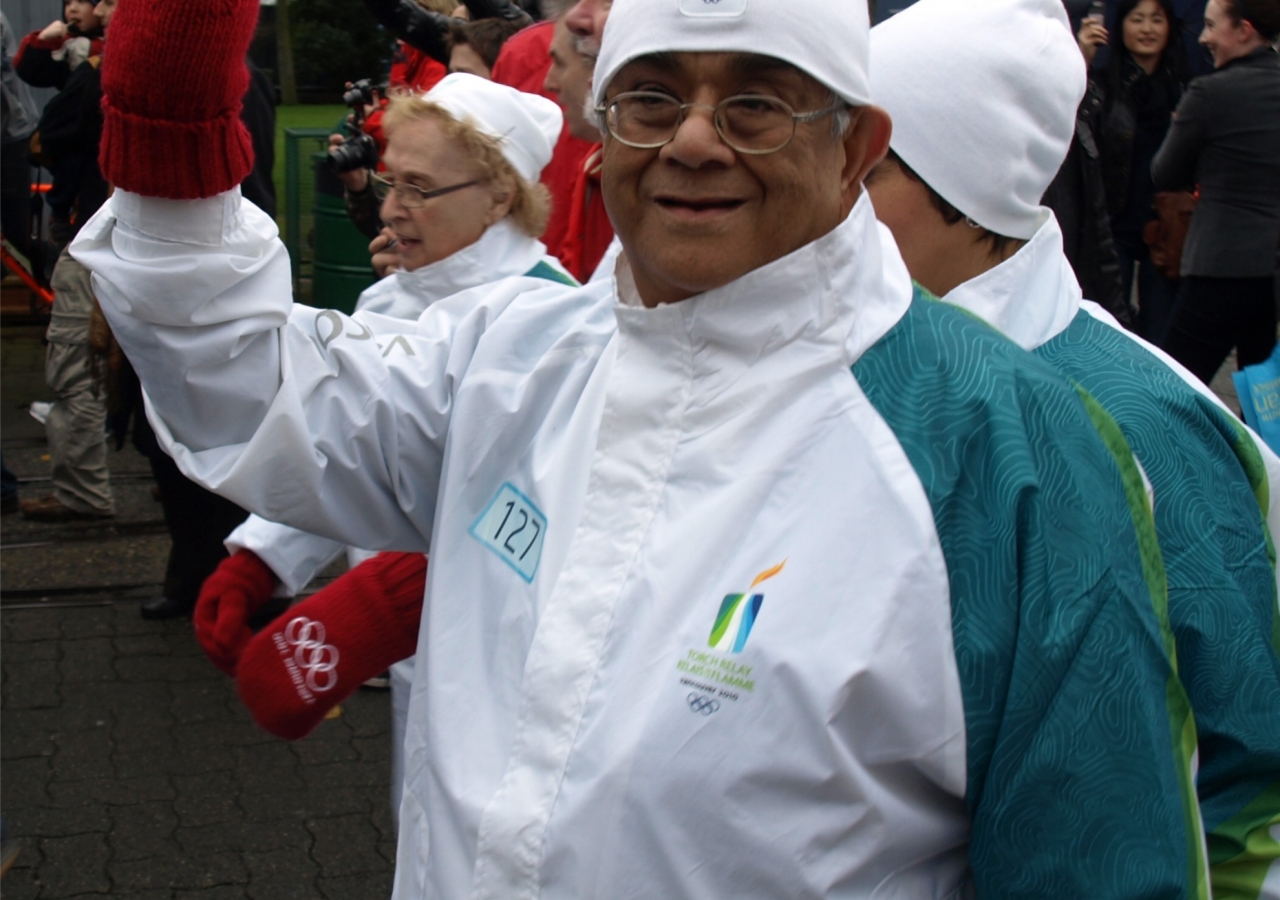 Olympic torch bearer Hassanali Merali following his run. He carried the flame as a representative of the Heart and Stroke Foundation.