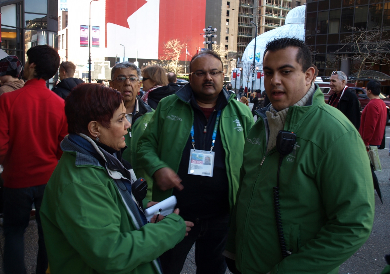 Easily identifiable in their green-coloured jackets, Ismaili volunteers in Vancouver City Centre have been welcoming tourists and athletes since the beginning of February.