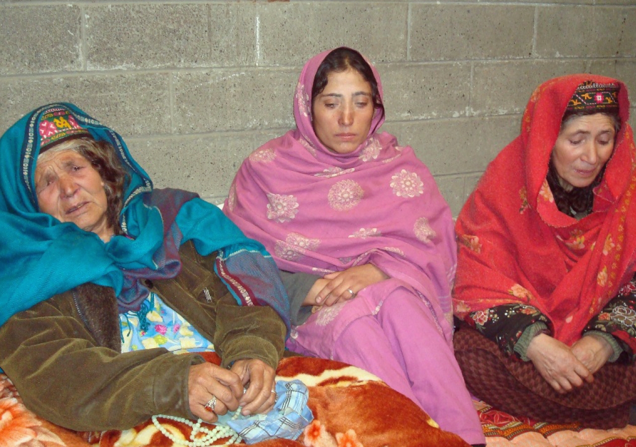 Women who survived the landslide rest in one of the schools that was re-purposed as a camp for internally displaced persons.