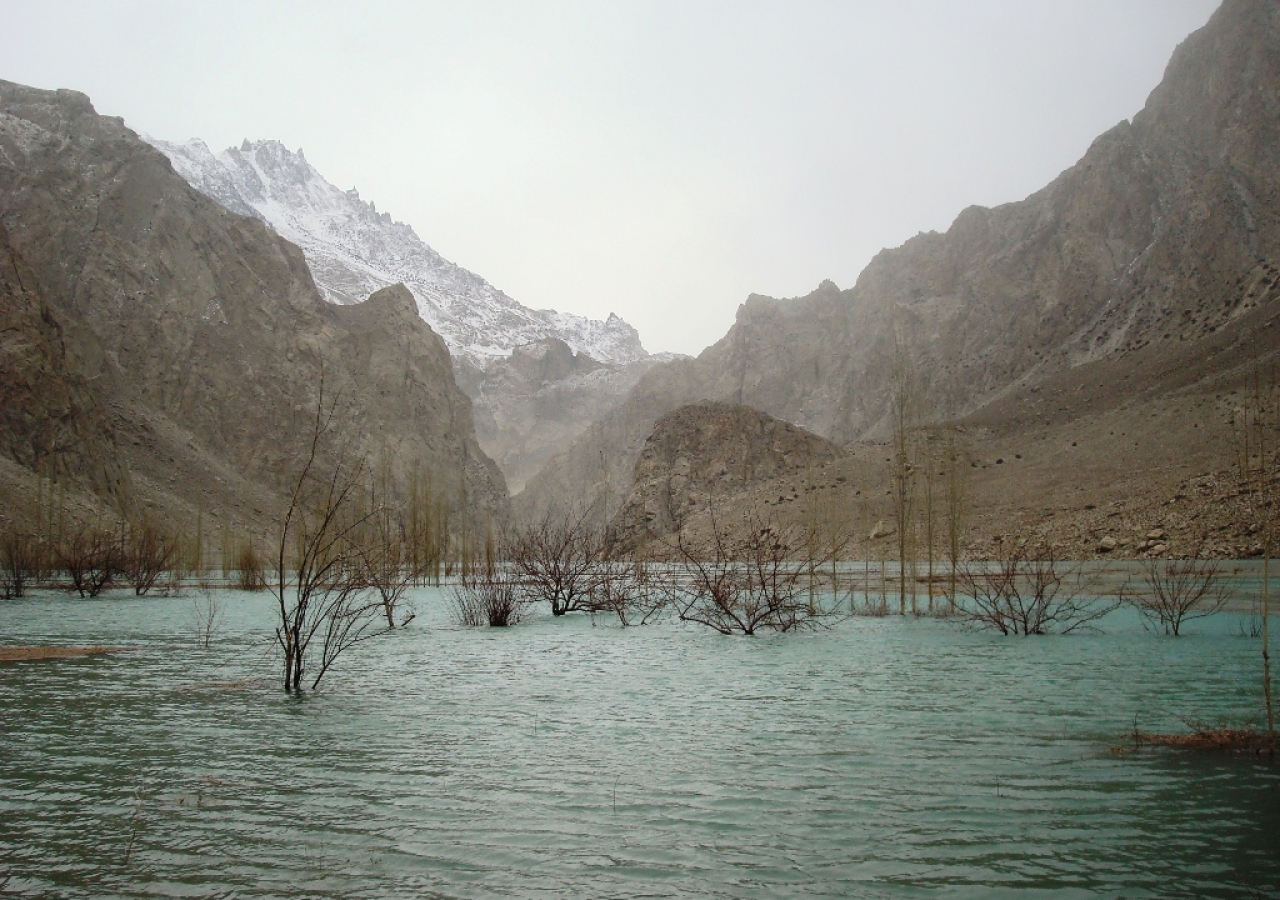 As a result of landslide debris blocking the Hunza River, a 12 kilometre lake has formed, swallowing up arable land, houses and animal sheds in Ayeenabad–Shishkat.