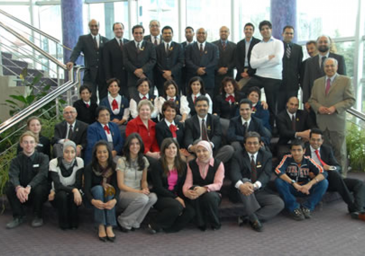 Edmonton volunteers and participants gather in the lobby of the Timms Centre after the Milad celebration 