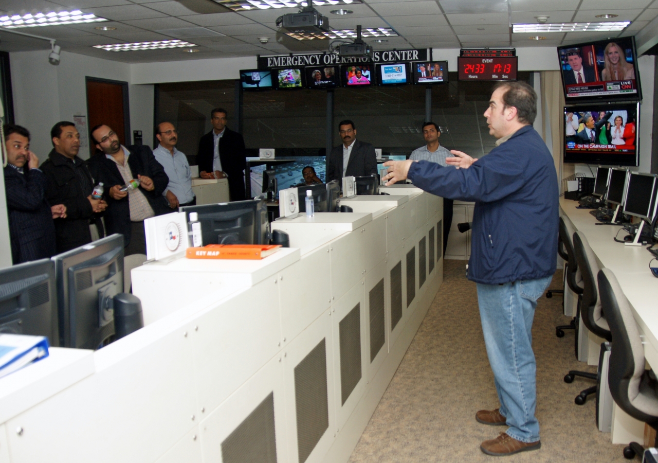 Michael Kahlenberg leads FOCUS Regional Disaster Managers on a tour of the Emergency Operations Center at the Harris County Office of Homeland Security and Emergency Management in Houston.